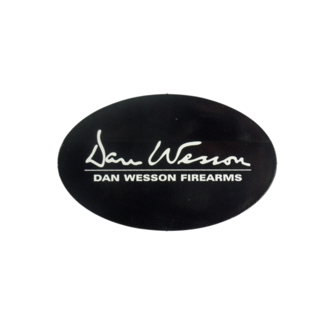 The Dan Wesson Black and White Oval Sticker showcases a sleek design with the "Dan Wesson" logo in elegant white script. Below the logo, the words "Dan Wesson Firearms" are prominently displayed in bold capital letters.